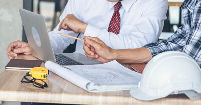 Business man having a meeting with contractor